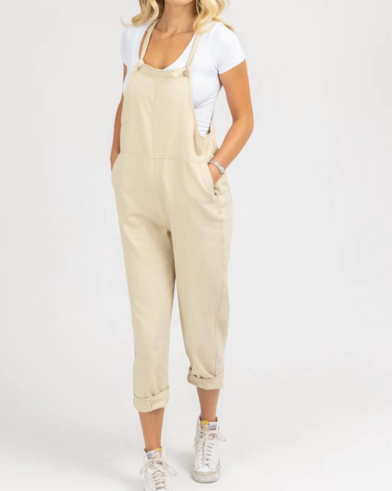 Front of a model wearing a size L Denim Relaxed Pocket Overall In Oatmeal in Oatmeal by CRESCENT. | dia_product_style_image_id:350495